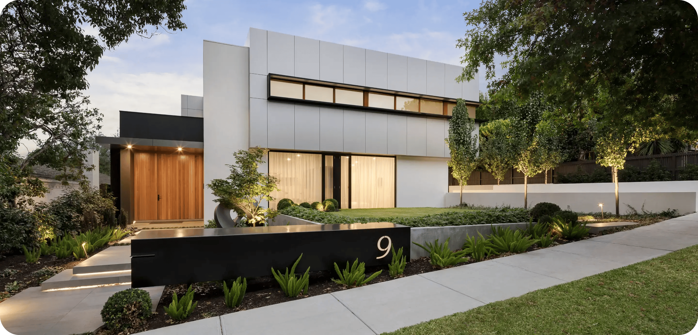 A front-facing picture of a modern, stylish home.